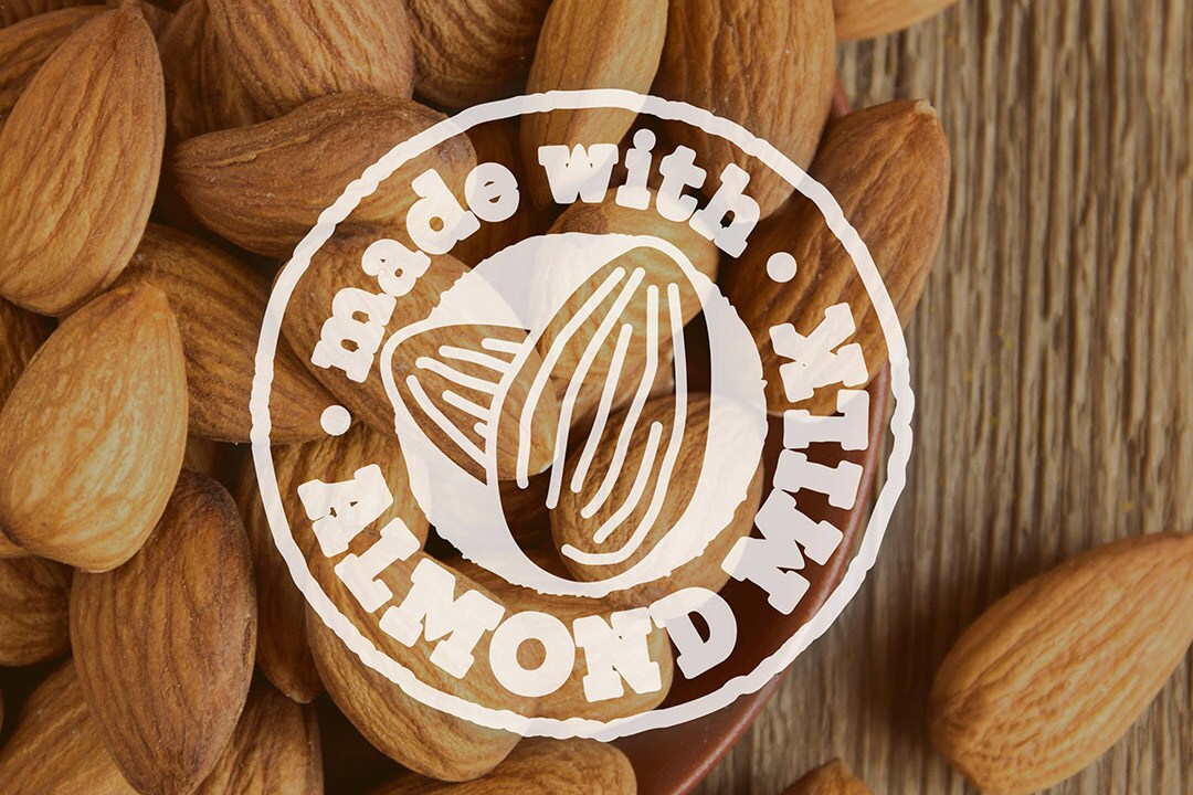 Una imagen con almendras y el logotipo “Made with Almond Milk”